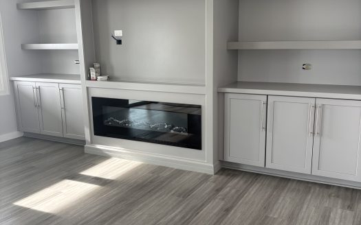 Elevated Southampton living with sweeping southwest water views and built-in income.